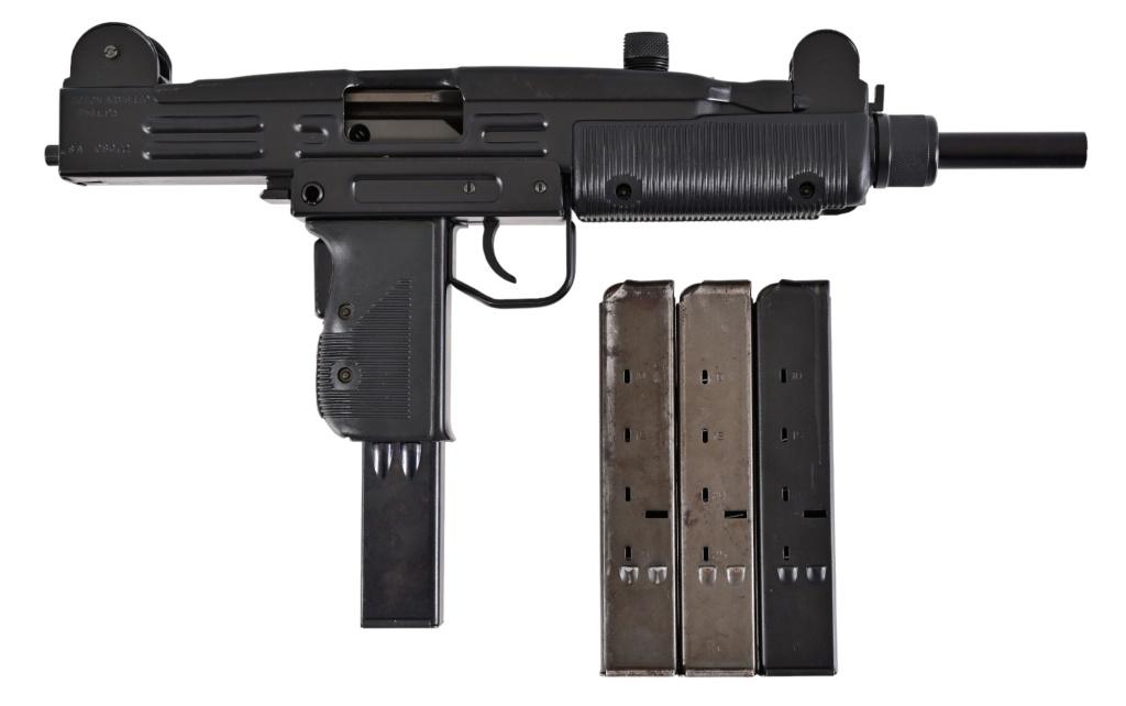 UZI Model A Semi-Auto 9mm Pistol: S/N SA08072. Appears to be in very good condition, with dummy 3.5" barrel. Comes with four magazines