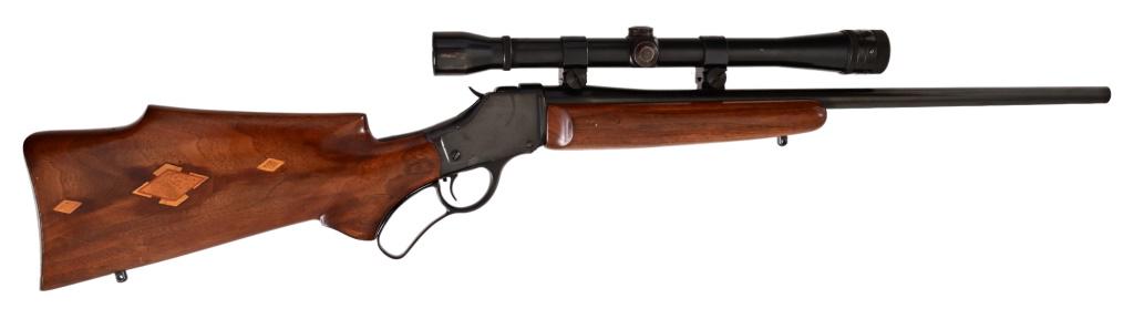 Custom Single Shot Lever Rifle: Maker not marked. Resembles Winchester low wall action but with full lever. Marked .219 improved Zipper cal. 22" barrel, custom stock. Weaver 10X scope. SN N/A . Modern.