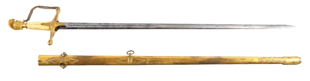 Ames Militia Officer Sword with Texas Star: This Ames militia officer sword has a knights head/helmet pommel with a high plume, a 5.75 inch cross guard decorated with a 5 point TEXAS STAR. The grip is carved bone. The blade is a double edged st