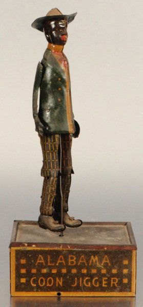 Strauss The Alabama Coon Jigger Tin Toy: Strauss The Alabama Coon Jigger Tin Toy Wind-Up. "Srauss Mfg. Co. New York U.S.A." One arm is present, but unattached, small connecting tab is gone. Measures 5" W x 3-1/4" D x 10" H.