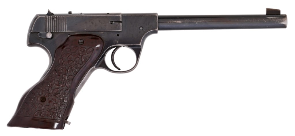 Hi-Standard Model B Target Pistol .22LR: Barrel measures 7", blue finish, Bakelite target grips. . Modern.
