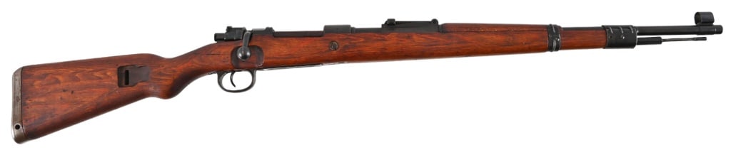 1944 WWII German Mauser Model 98 8mm: 1944 byf code which is Mauser Oberndorf. Very good condition late war 98. Laminate wood, 24" barrel, fairly nice bore. Shows late war manufacturing economies such as no bayonet lug, fake cleaning rod