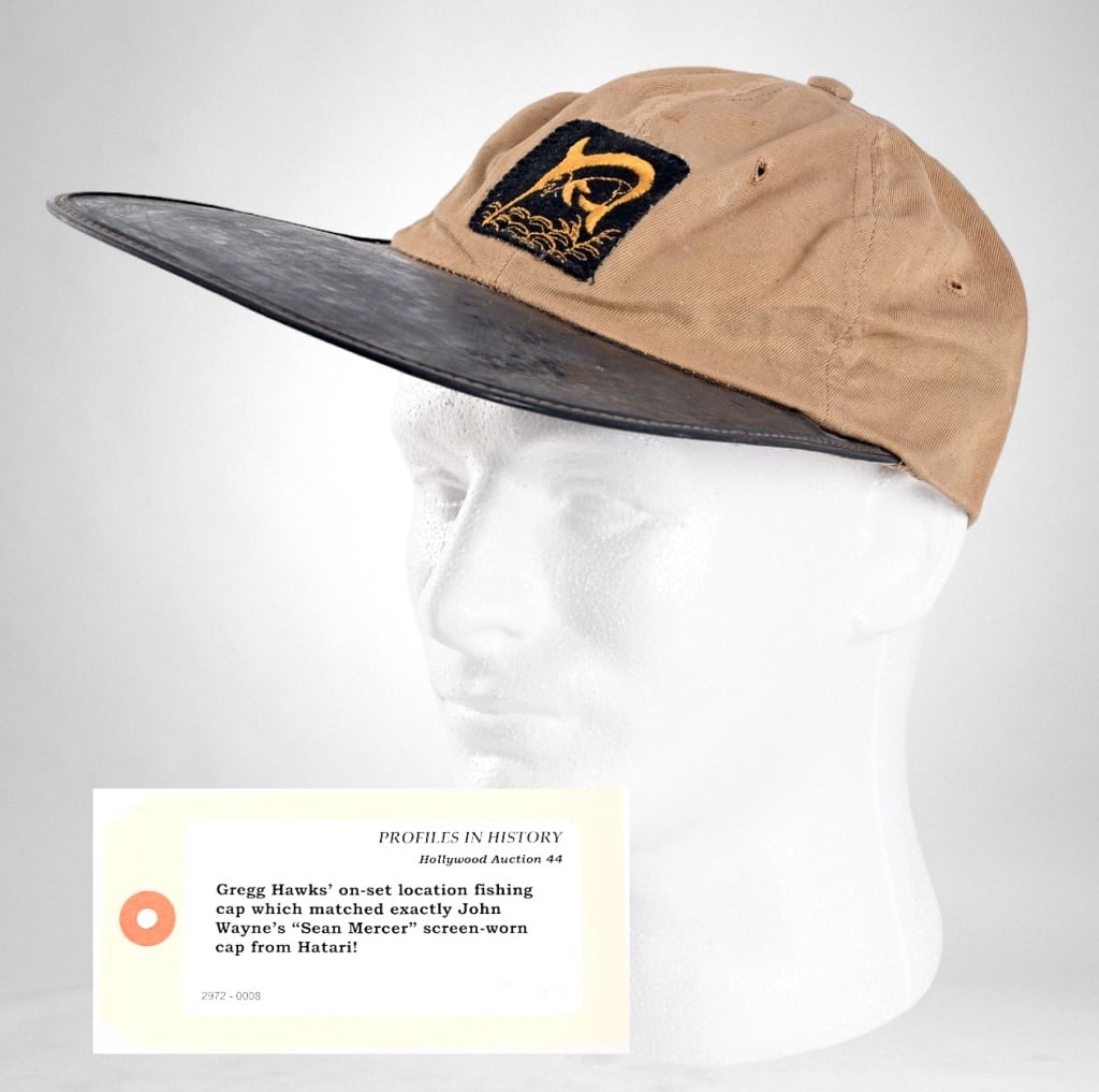 "Hatari" Gregg Hawks' On-Set Fishing Hat: Matching the hat used by John Wayne's character "Sean Mercer" in "Hatari", this exact copy was worn by director Howard Hawks' son Gregg on-set. Was purchased in 2011 at auction from Gregg Hawks' estat