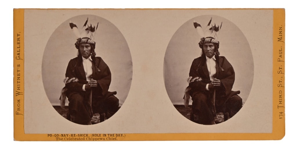 Chippewa Chief Stereoview Card Indian Photograph: Po-Go-Nay-Ke-Shick, (Hole In The Day.) The Celebrated Chippewa Chief. Whitney's Gallery, St. Paul Minnesota. Stereoview card measures 3.5" x 7