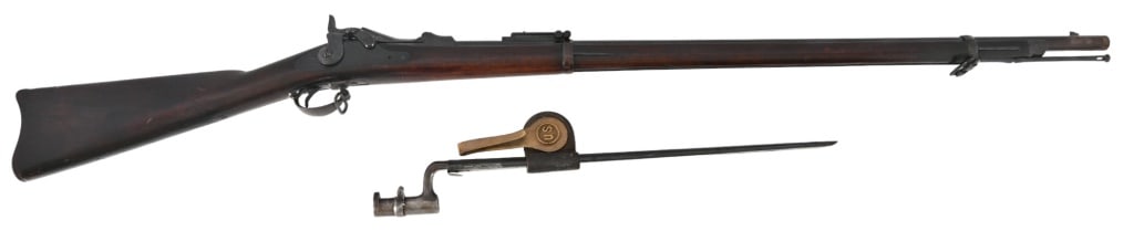 US 1884 Springfield Trapdoor Rifle w/ Bayonet: S/N 498477. U.S. model 1884, 32" barrel. Good condition, fair bore. US issue bayonet with scabbard and belt clip. Antique
