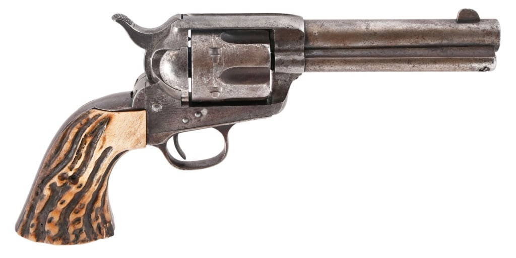 Colt Model 1873 SAA .45: S/N 129473. 1st. Gen., 4 3/4" barrel. Working condition, matching numbers. Stag style grips. 1889 manufacture. Factory letter states: shipped to E.C. Meacham Arms Co., St. Louis Missouri, June 17, 188