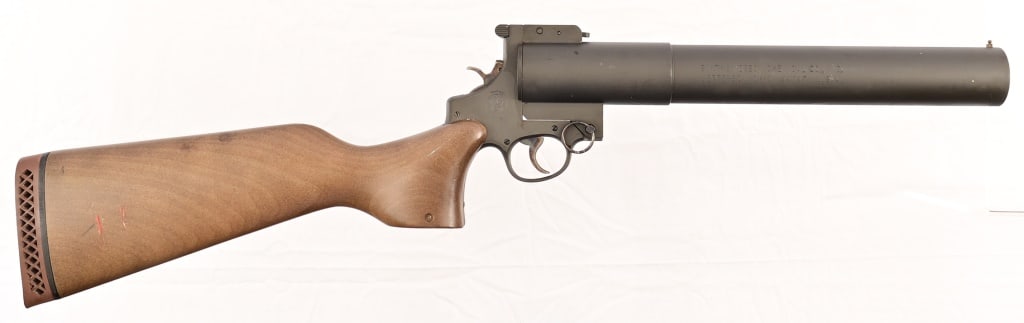 S&W Chemical Model 276 37mm Tear Gas Gun: Modified S&W "N-frame" double action, 14" barrel. Used for riot control, rifle stock with Black Sheep Brand, Dallas Texas butt pad. Serial PY3319