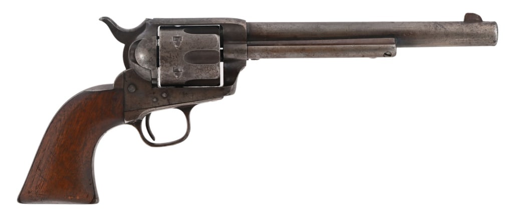 Colt Model 1873 SAA .45 Hartley & Graham NY 1881: S/N 63815, manufactured in 1881. Blue finish, 7.5" barrel. Working condition. One piece wood grips have F with triangle carved on one side. Factory letter shows shipped to Hartley and Graham, New York