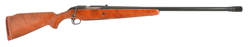 Mossberg Bolt Action 12 Gauge Shotgun: 28" barrel with C-Lect-Choke. Stock is solid with handling marks and recoil pad. High percentage of bluing remains with some surface rust in various areas. Missing magazine. Modern.