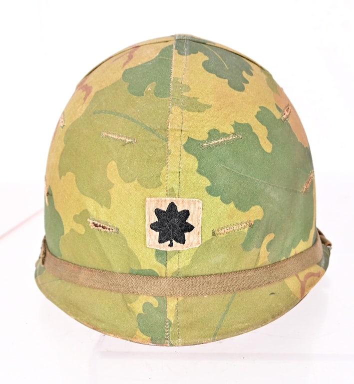 US Army Lt. Colonel M-1 Helmet & Liner: Inscribed in both with "Robert E. Bingham 4024743". With camouflage canvas cover. LTC Robert E. Bingham, (b.1933-d.2012), served in the U. S. Army Artillery 82nd Airborne with tours in Korea twice and