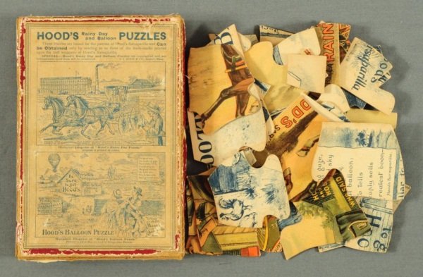 Hood's Sarsaparilla Advertising Puzzle: Hood's Rainy Day & Balloon Race Puzzle In original box. Advertising Hood's Sasparilla.