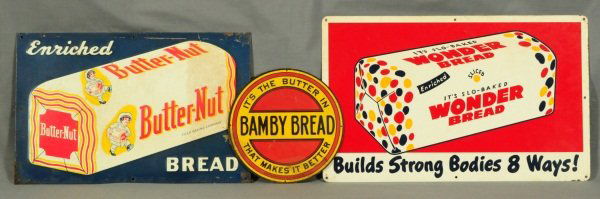 3 Vintage Bread Advertising Tin Signs: Wonder Bread (20" x 12-1/2"), Butter-Nut (17-1/2" x 11-1/4"), and Bamby Bread (8-3/4" D).