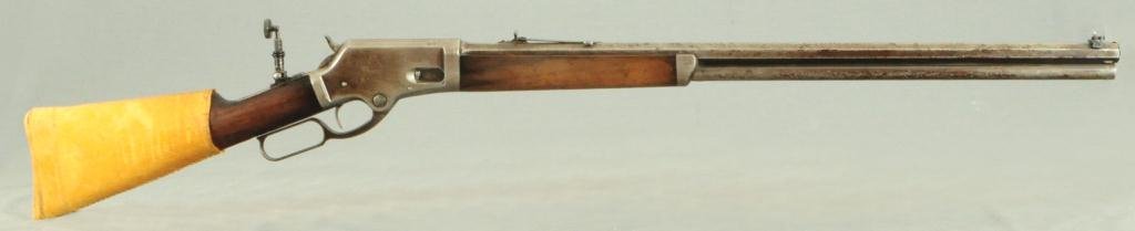 Marlin Model 1886 Rifle .45-70: 28" barrel, leather rear stock cover, flip up peep hole sights, ser# 14732