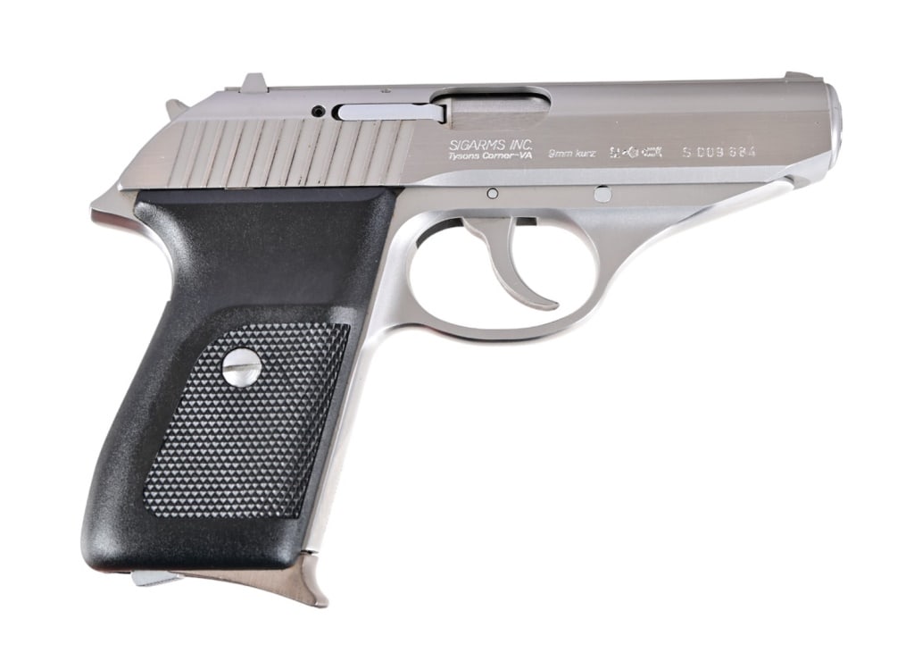 Sig Sauer P230-SL Semi-Auto 9mm Kurz: S/N S009684. Like new in original box with spare magazine. Chambered in (.380) 9mm Kurz. Modern
