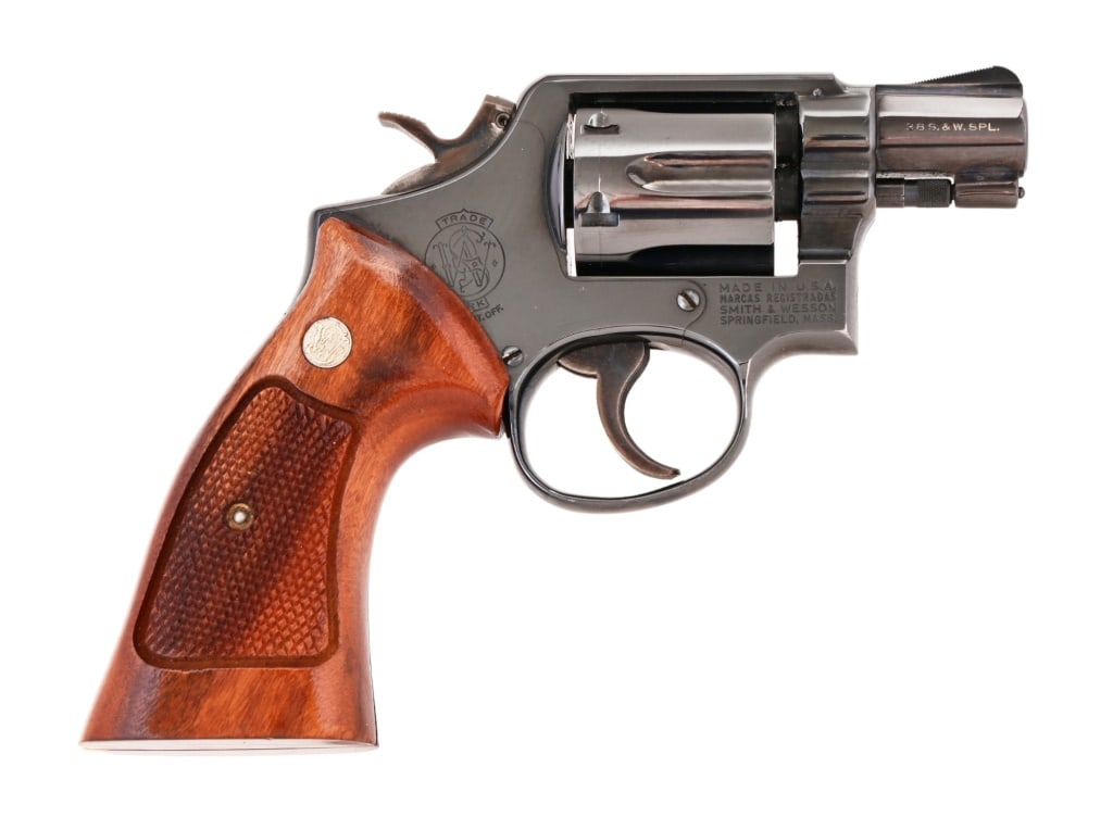 Smith & Wesson Model 10-5 Revolver .38 Special: S/N D846269. 2" barrel, blue finish, oversized Goncalo Alves grips, case hardened standard trigger and hammer. Excellent condition. Modern.
