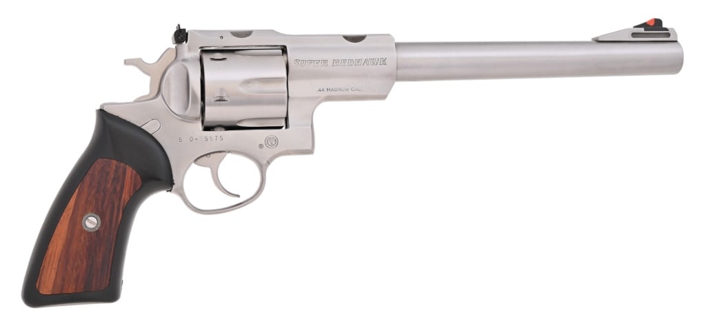 Ruger Super RedHawk .44 Magnum Revolver: S/N 550-15575. Stainless finish, hybrid wood/rubber grip, 9.5" barrel. Excellent condition, with original Sturm, Ruger box and scope mount. Modern