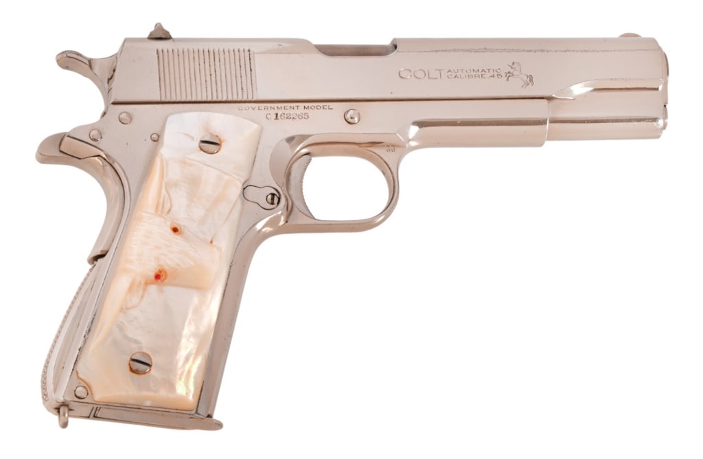 Colt 1911A Government Model Semi-Auto .45ACP: SN C16226, manufactured 1932. Colt Government Model 1911A semi-automatic pistol. Nickel finish with Mother-of-pearl steer head grips. Very good condition, solid action and bore. Modern.