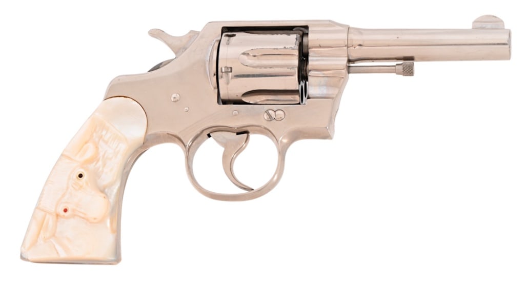 Colt Army Special .38 Special Revolver and Holster: SN 505855, manufactured 1924, Colt Army .38 Special revolver. Nickel finish with Mother-of-pearl steer head grips, 4" barrel. Very good condition action, and bore. Some nickel loss on cylinder, and pe