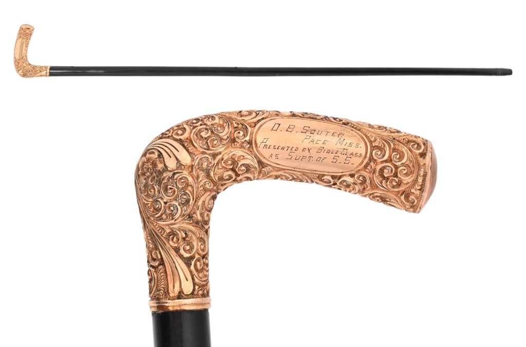 Engraved Gold Presentation Walking Cane: Engraved "D.B. Souter Pace, Miss. Presented By Bible Class As SUPT Of S.S." Measures 35.5" in length.