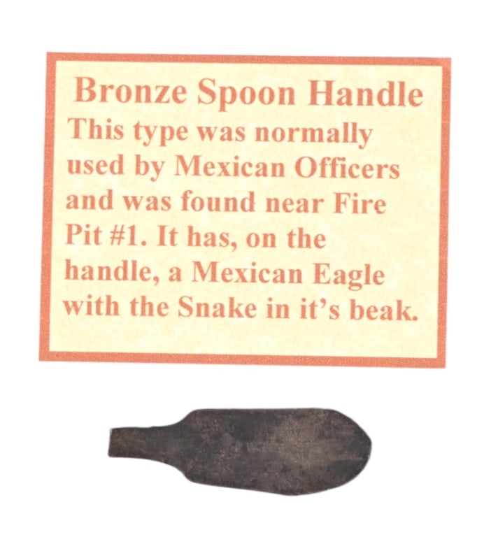 Alamo Battlefield Relics From 2008 Excavation: Bronze Spoon handle, Mexican Eagle with snake motif. Found near fire pit #1 during the excavation.