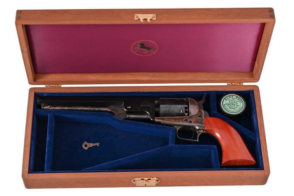 Colt 1851 Navy 2nd Generation .36 Cal Revolver: SN 23896. As new, cased in Colt wooden box. 7.5" barrel. Colt made reproduction Black Powder guns from 1971-1982. Black Powder.