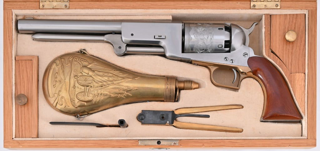 Colt Walker 2nd Generation .44 Cal Revolver: SN 06540. As new, cased in Colt wooden box. 9" barrel. Has bullet mold and powder flask. Colt made reproduction Black Powder guns from 1971-1982. Black Powder.