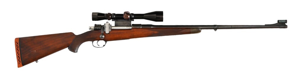 Hoffman Arms Co. .375 Rifle: SN 3659. Hoffman produced custom rifles in the 1930's. This is a very nice condition example. 27" barrel, dark bore with rifling. Leupold 3 X 9 scope in quick detach mounts. Modern.