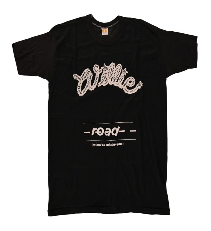 Willie Nelson "Roadies" T-Shirt 1975: Extremely rare 1975 "Roadies" t-shirt for Willie Nelson and the Family. From the collection of longtime Willie Nelson artist, Steve Brooks. Size large (42-44)