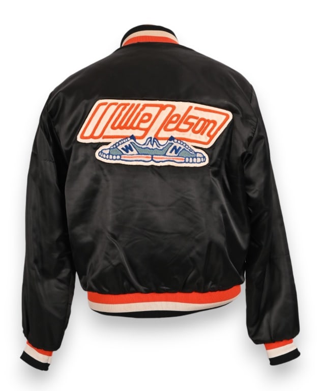 Steve Brooks' 1980 Willie Nelson Tour Jacket: Tennis Shoe design, 1980 Willie Nelson & Family tour jacket, personally embroidered on front for, and from the collection of longtime Willie Nelson artist Steve Brooks. Medium. Measures approx. 18" sh