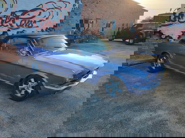 1966 Blue Mustang with Black Top