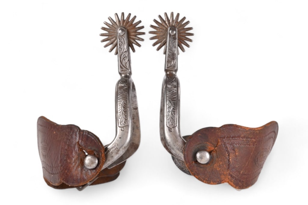 AB Buermann Marked Spurs w/ Miles City Straps: A B Buermann star marked spurs with, "Hand Forged Steel". Miles City Saddlery, Montana tooled leather straps. 2" rowels
