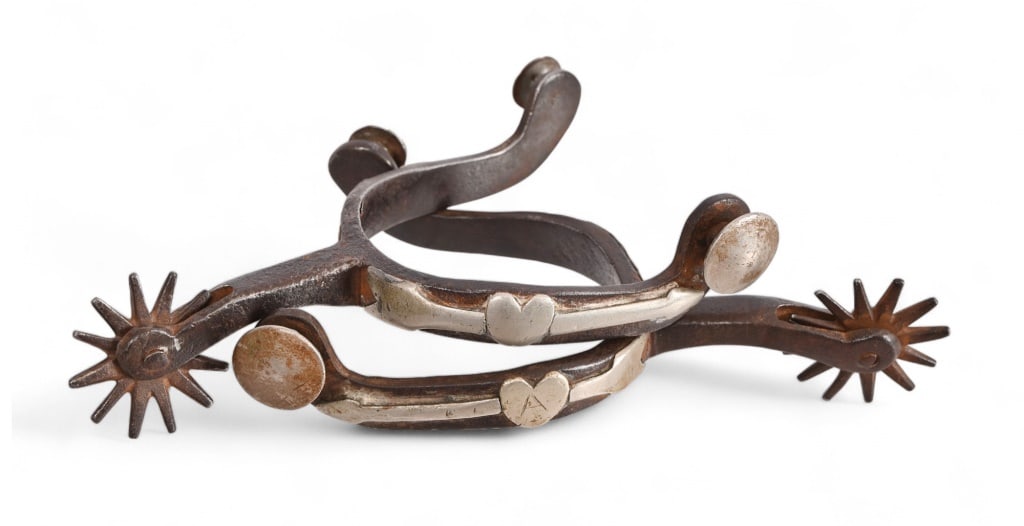 Antique Unmarked Double Mounted Spurs: Unmarked, heart-through-arrow design follows likely McChesney pattern.