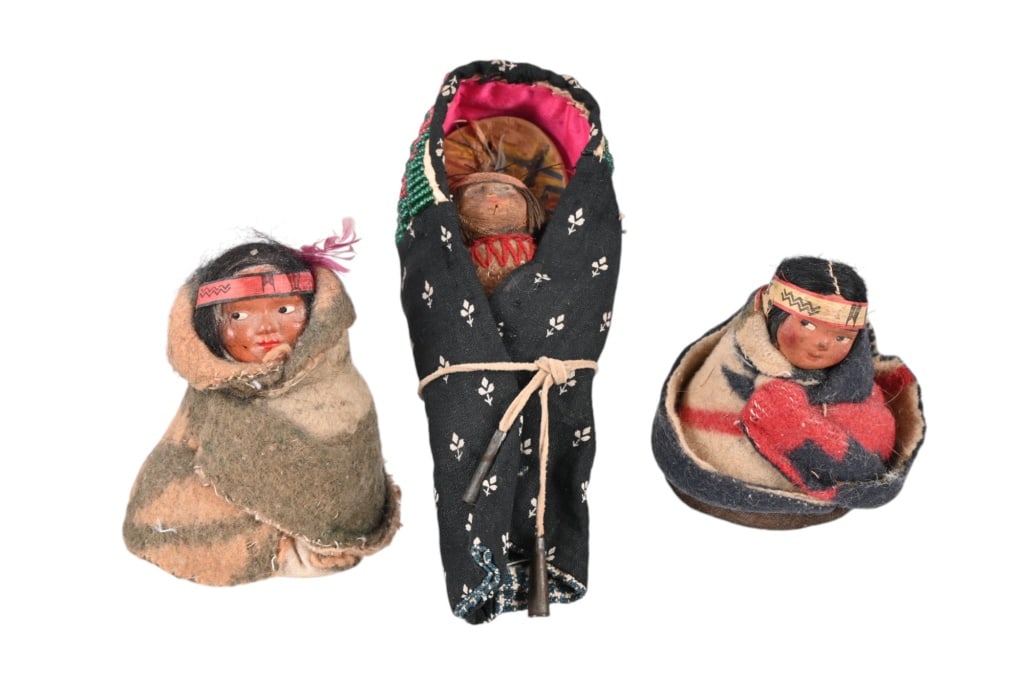 Collection Of (3) Skookum Infant Indian Dolls: (2) Wrapped in blankets wearing head bands 3" & 2.75".. (1) Papoose 5".