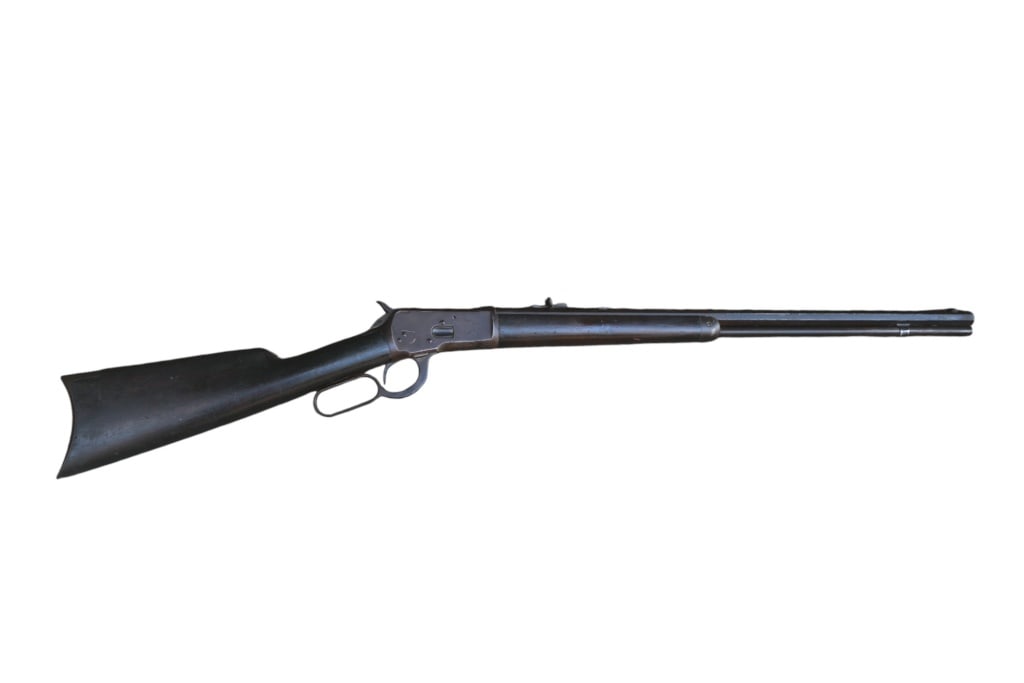 Winchester Model 1892 Lever Action Rifle .32-20: S/N 246038. 24" octagon barrel, dark bore. Tight action, gray patina finish. Wood is solid with scuffs and handling marks. Modern.