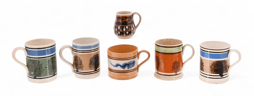 Collection of Antique English Mochaware Mugs: Five mugs, with one small 3" creamer pitcher. Circa 1800's
