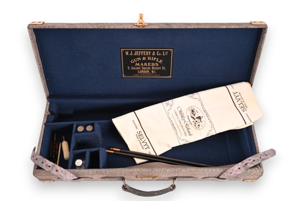 W.J. Jeffrey & Co Take-Down Elephant Rifle Case: W. J. Jeffrey & Co. Case is outer covered in elephant hide. Circa 1980's. 27" x 10" x 4.5.