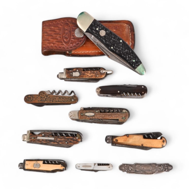 Collection of (10) Vintage Folding Knives: Includes a full Sterling Silver (even blade) pocket knife or letter opener. Joseph Allen & Son Sheffield stag handle trapper with hoof pick. Boker Solingen large trapper; F. Ward & Co. Sheffield "B4An