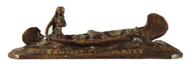 Samoset Chocolates Indian In Canoe Store Display: Painted chalkware advertising store display figure. 36" L x 9" D x 11" H.