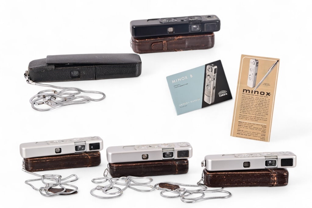 Collection of Minox German Sub-Mini Spy Cameras: (Five) Minox sub-miniature spy cameras, with leather Speci-cases