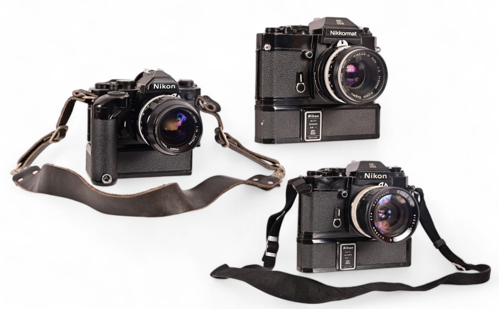 Collection of (3) Nikon Vintage 35mm Cameras: (2) Nikon Nikkor EL Autowinder, one with Soligor 28mm Wide Lens, one with Nippon Kogaku 50mm lens; Nikon FE with MD-11 motor drive mount (missing internal) Nippon Kogaku 35mm lens