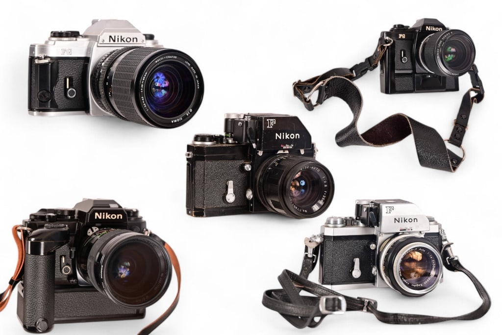 Collection of (5) Nikon Vintage 35mm Cameras: Nikon F with Soligor Wide-Auto 35mm lens; Nikon FA with MD-12 Autowinder and Vivitar Series 1 VMC 67mm lens; Nikon FG with Sigma 80mm lens; Nikon FG with Nikon Series E Promaster Spectrum 72mm lens; N