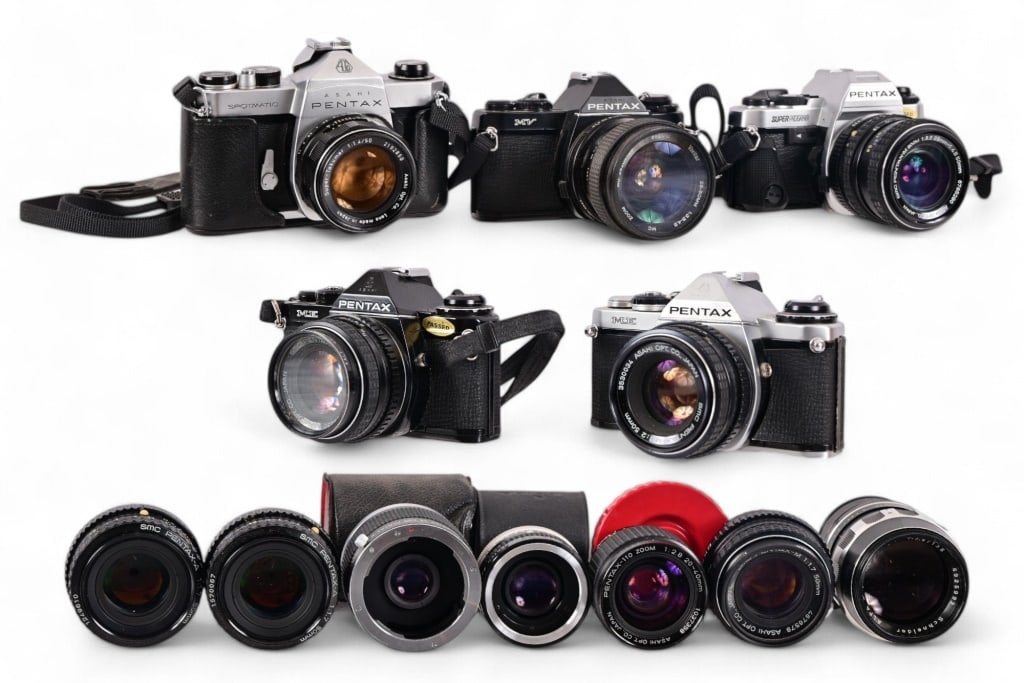Collection of Vintage Pentax 35mm Cameras & Optics: (Five) Vintage 35mm cameras: Pentax Spotmatic SP with Asahi Super-Takumar 50mm lens; (2) Pentax MEmodels (both black and silver), with Asahi 50mm lens; Pentax Super Program with Asahi 50mm lens; Penta