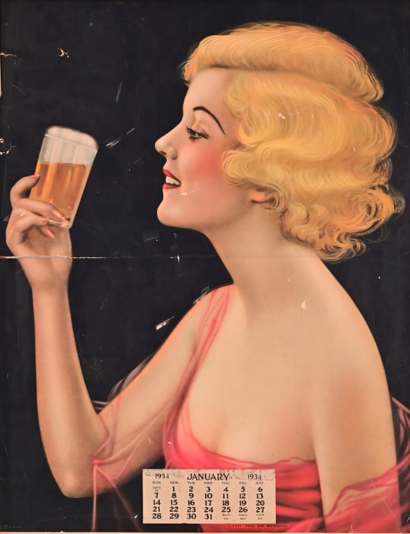Framed Beer Calendar January 1934: Lady eyeing a cold glass of beer. 15" x 19". Frame measures 21" x 25". Torn in the center.