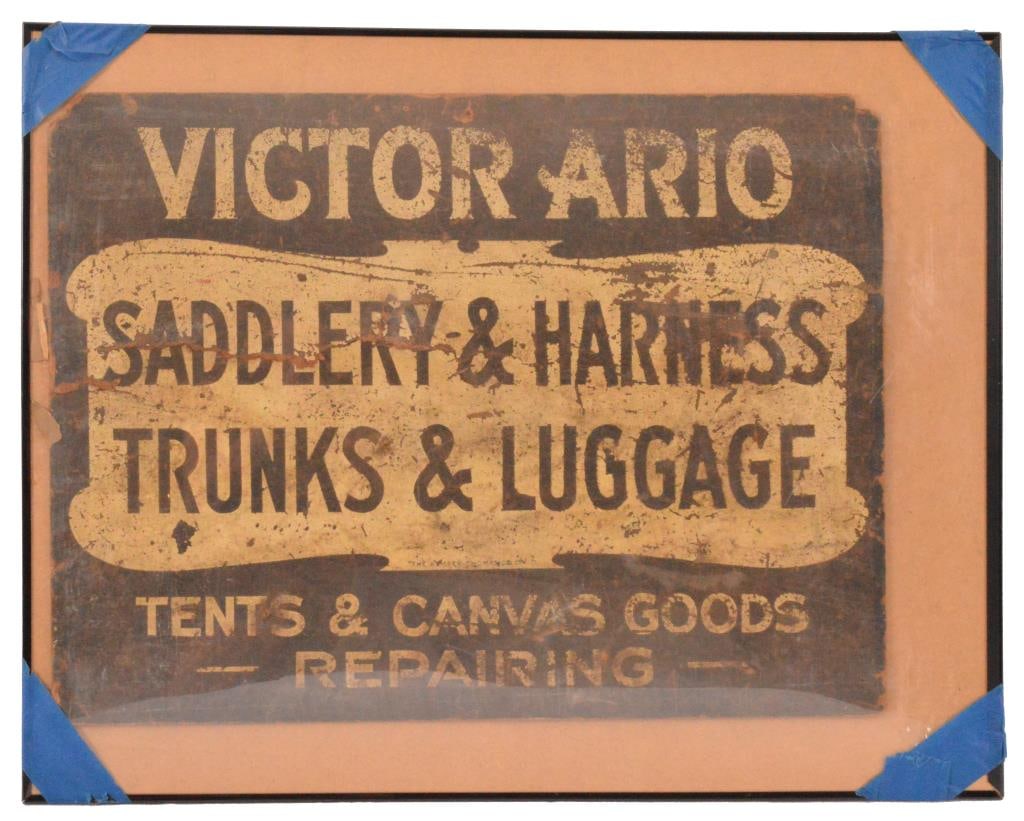 Victor Ario Saddlery & Luggage Sign: Pressed Board Sign Measures 18" x 23.75" -