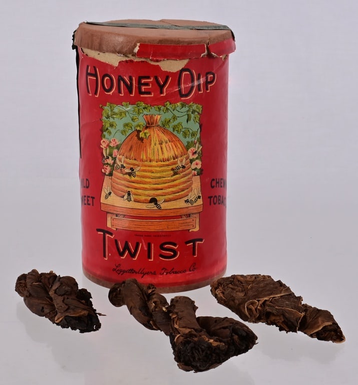 Honey Dip Twist Chewing Tobacco Drum: Honey Dip Twist Chewing Tobacco Drum With Twists. Measures 4 1/2" diameter 7 1/4" tall. Lid has a piece torn off otherwise good condition.