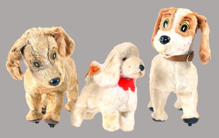 Three Mechanical Toy Dogs