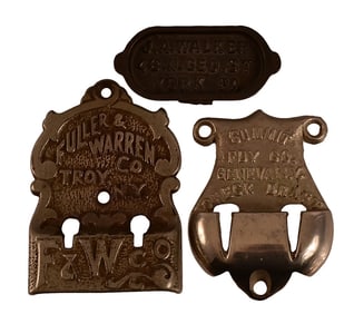 Three Cast Iron Stove Parts