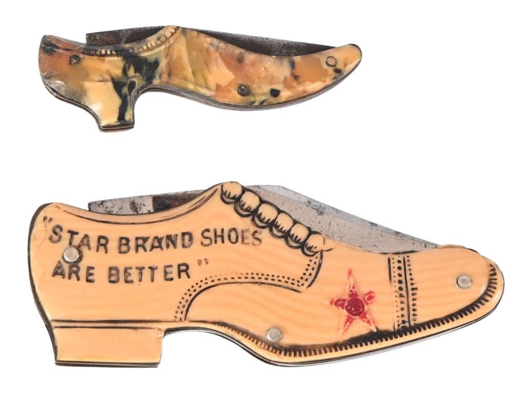 Two Shoe Shaped Pocket Knives, One advertising: Two (2) Shoe Shaped Pocket Knives. One Advertising Star Brand Shoes, Mens' Patriot $3.50. The small One without advertising measures 1.75" closed 3" open. The Star Shoe knife measures 2.75" closed 4.7