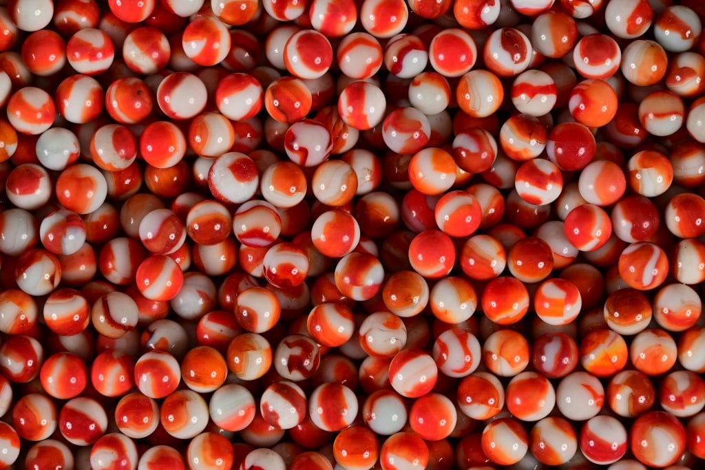 Collection of 593 Vintage Orange and White Swirl Marbles (1 of 1)