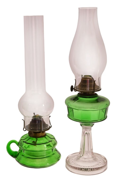 Two Antique Green Glass Hurricane Lanterns: Two (2) Antique Green Glass Hurricane Lanterns. Excellent Condition. 15.5" Tall and 14.75" Tall.